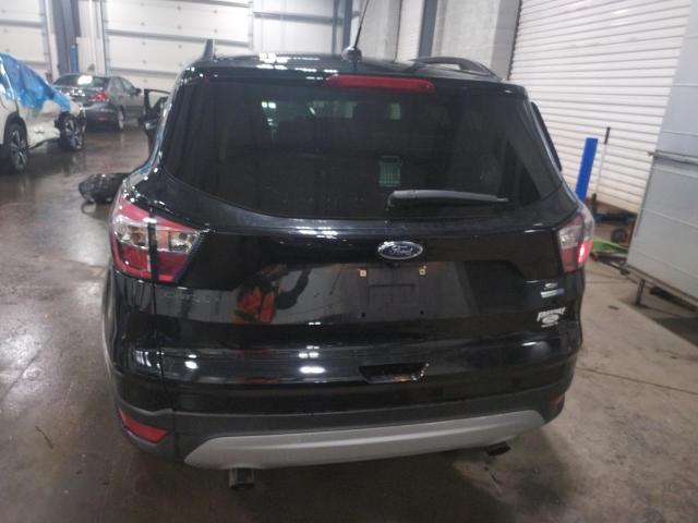 Photo 6 from auction – 2018 FORD ESCAPE SE with VIN 1FMCU9GD9JUB43680