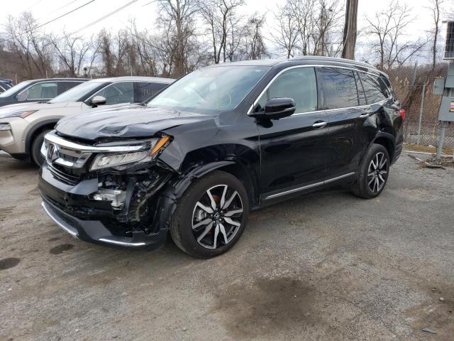HONDA PILOT TOUR 2022 with VIN 5FNYF6H62NB059170 - Photo from auction
