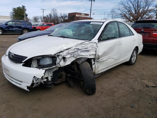 TOYOTA CAMRY LE 2004 with VIN 4T1BE32K54U313128 - Photo from auction