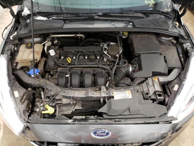 Photo 11 from auction – 2015 FORD FOCUS SE with VIN 1FADP3F23FL270568