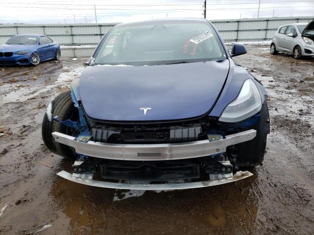 Photo 5 from auction – 2022 TESLA MODEL 3 with VIN 5YJ3E1EB2NF290653