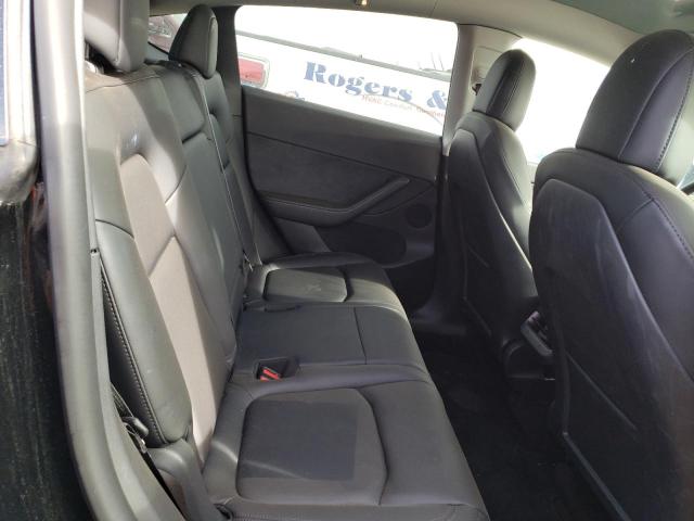 Photo 11 from auction – 2022 TESLA MODEL Y with VIN 7SAYGAEE8NF427057
