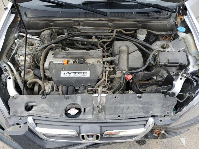 Photo 12 from auction – 2004 HONDA CR-V EX with VIN JHLRD78824C024824