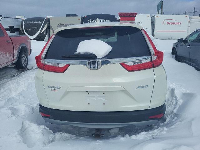 Photo 6 from auction – 2017 HONDA CR-V EX with VIN 2HKRW2H52HH135755