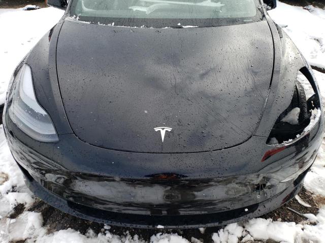 Photo 11 from auction – 2021 TESLA MODEL 3 with VIN 5YJ3E1EB5MF034697