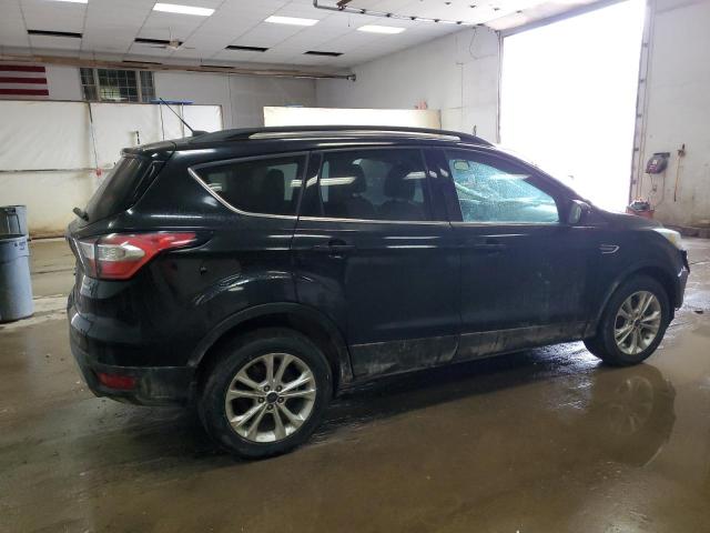 Photo 3 from auction – 2017 FORD ESCAPE SE with VIN 1FMCU9GDXHUC98779