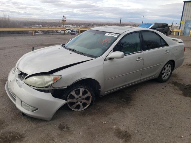 TOYOTA CAMRY LE 2005 with VIN 4T1BF30K55U601698 - Photo from auction