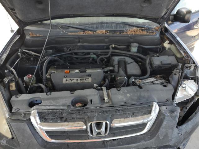 Photo 11 from auction – 2003 HONDA CR-V LX with VIN JHLRD68573C004521
