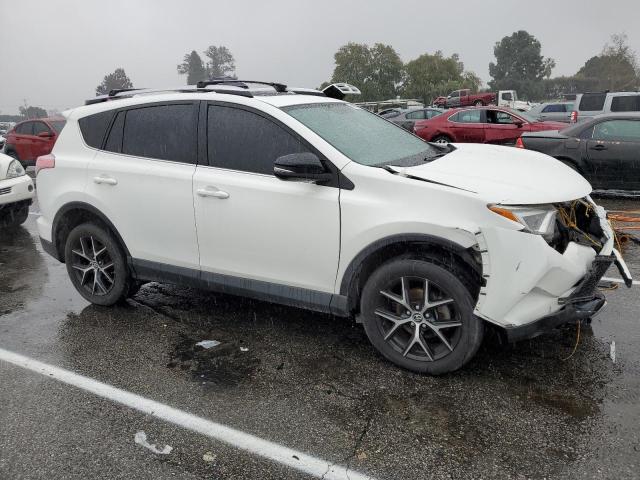 Photo 4 from auction – 2016 TOYOTA RAV4 SE with VIN JTMNFREV8GJ065762