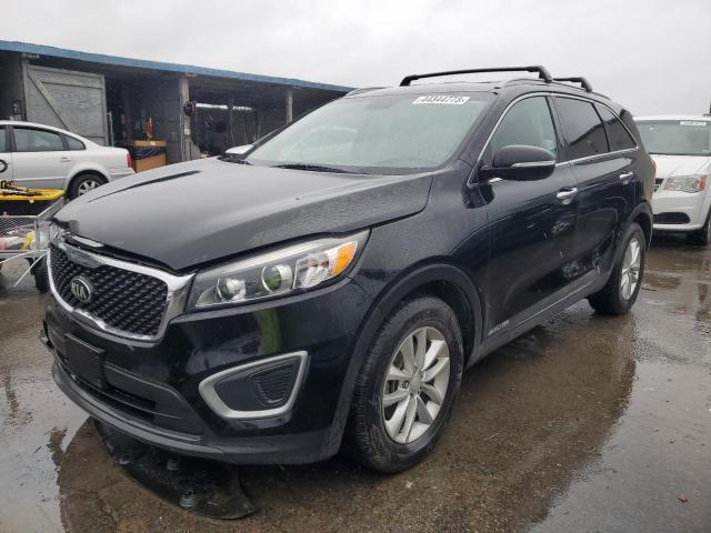 KIA SORENTO LX 2016 with VIN 5XYPGDA54GG033261 - Photo from auction
