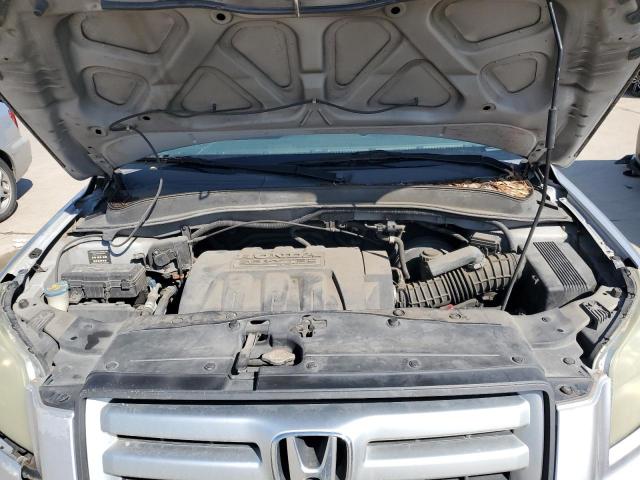 Photo 12 from auction – 2006 HONDA PILOT with VIN 5FNYF28106B024884