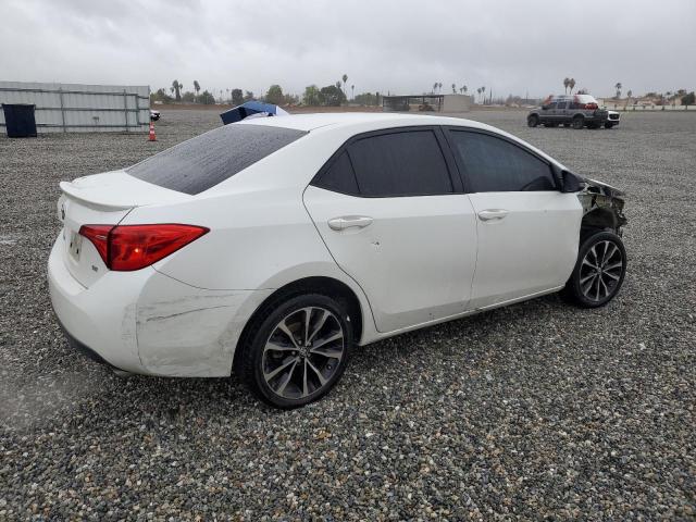 Photo 3 from auction – 2018 TOYOTA COROLLA L with VIN 5YFBURHE4JP772462