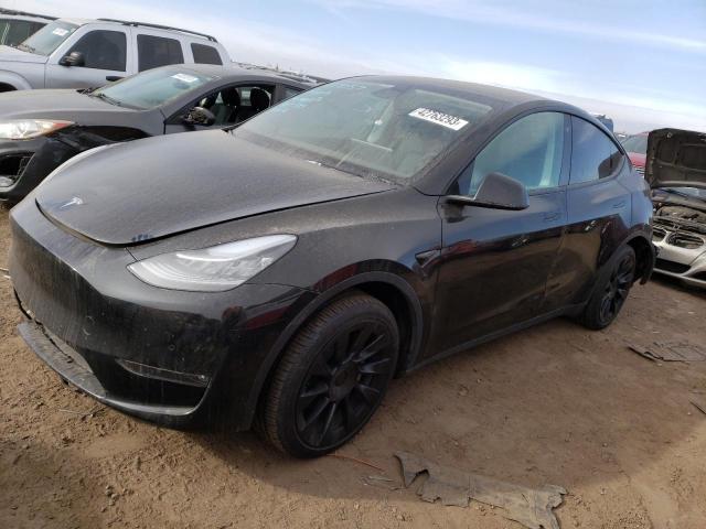 TESLA MODEL Y 2022 with VIN 7SAYGAEE8NF427057 - Photo from auction