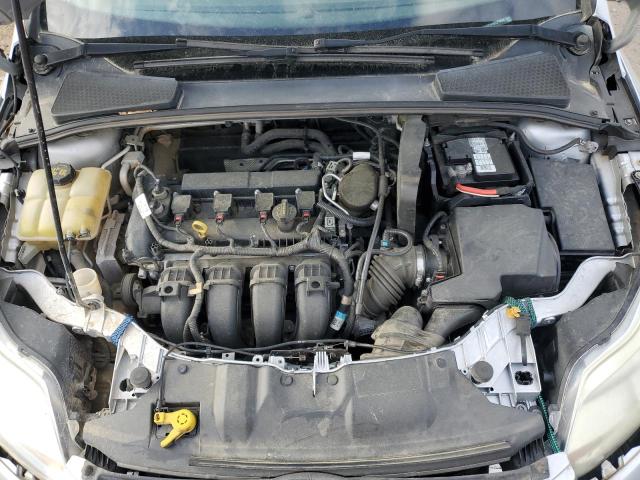 Photo 11 from auction – 2014 FORD FOCUS SE with VIN 1FADP3F28EL215676