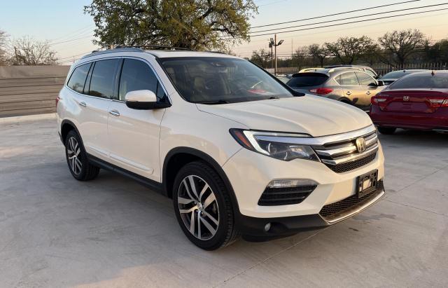 HONDA PILOT ELIT 2017 with VIN 5FNYF6H08HB040817 - Photo from auction