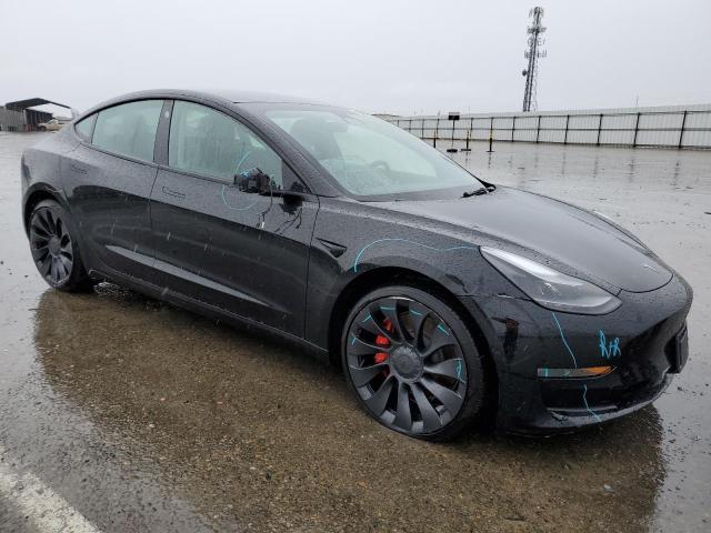 Photo 4 from auction – 2022 TESLA MODEL 3 with VIN 5YJ3E1EC1NF263954