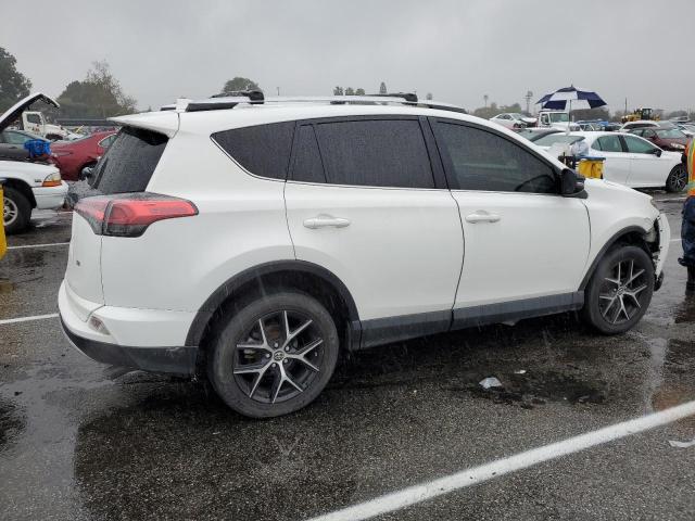 Photo 3 from auction – 2016 TOYOTA RAV4 SE with VIN JTMNFREV8GJ065762