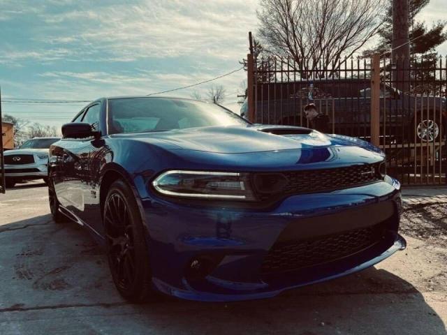 DODGE CHARGER 2021 with VIN 2C3CDXGJ2MH584660 - Photo from auction