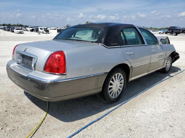 Photo 3 from auction – 2004 LINCOLN TOWN CAR E with VIN 1LNHM81W14Y655733