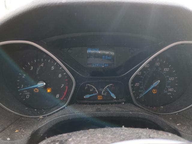 Photo 9 from auction – 2014 FORD FOCUS S with VIN 1FADP3E21EL418393