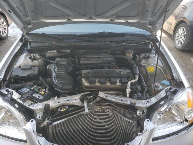 Photo 11 from auction – 2002 HONDA CIVIC LX with VIN 1HGEM22592L028137