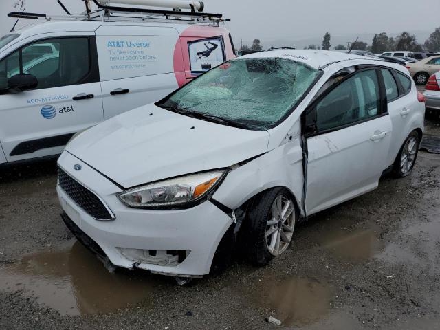 FORD FOCUS SE 2016 with VIN 1FADP3K2XGL392142 - Photo from auction