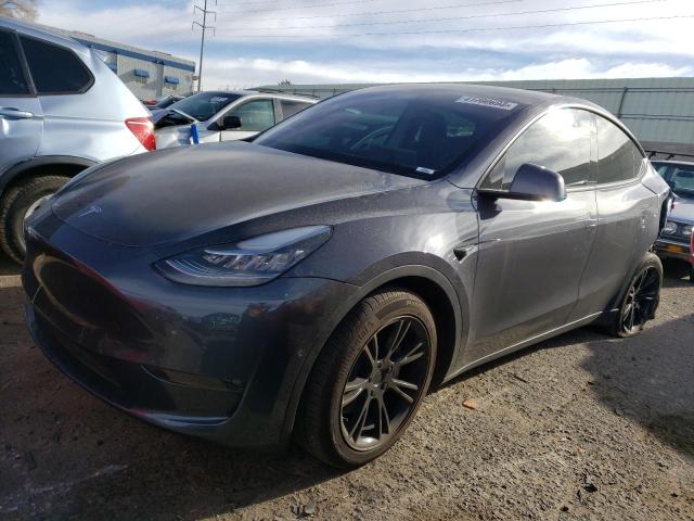 TESLA MODEL Y 2022 с VIN 7SAYGAEE8NF327220 - Фото с аукциона