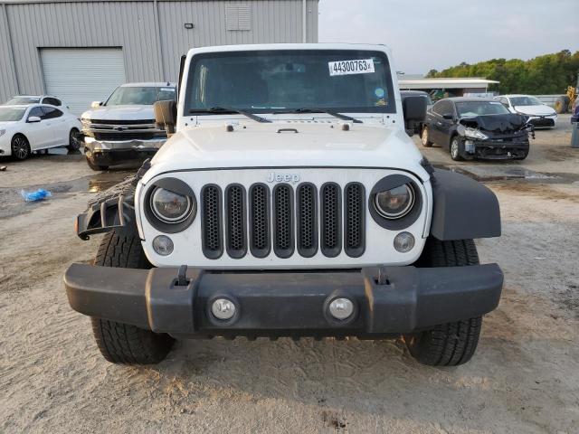 Photo 5 from auction – 2014 JEEP WRANGLER U with VIN 1C4BJWDG9EL177233