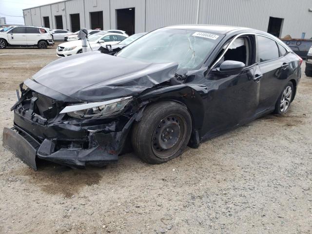 HONDA CIVIC LX 2018 with VIN 19XFC2F57JE009223 - Photo from auction
