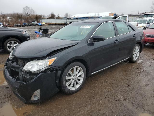TOYOTA CAMRY L 2014 with VIN 4T4BF1FK2ER417319 - Photo from auction