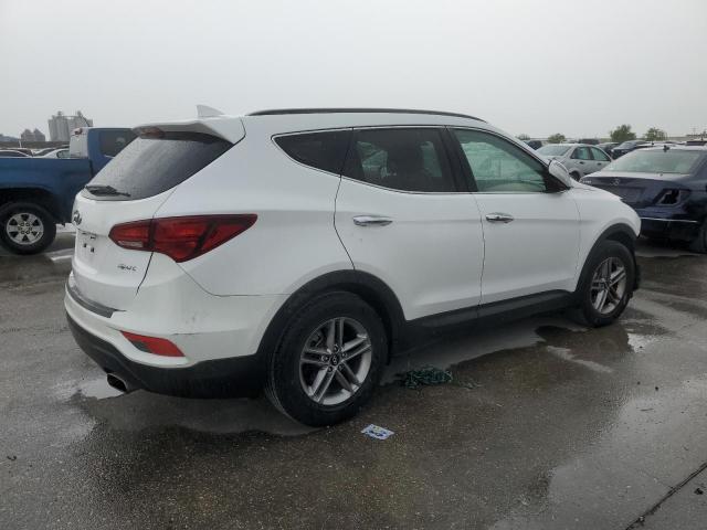 Photo 3 from auction – 2018 HYUNDAI SANTA FE S with VIN 5NMZU3LB8JH101461