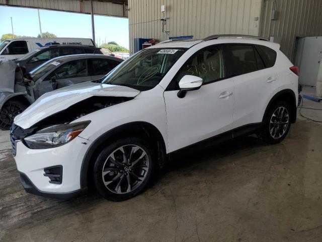 MAZDA CX-5 GT 2016 with VIN JM3KE2DY2G0753844 - Photo from auction