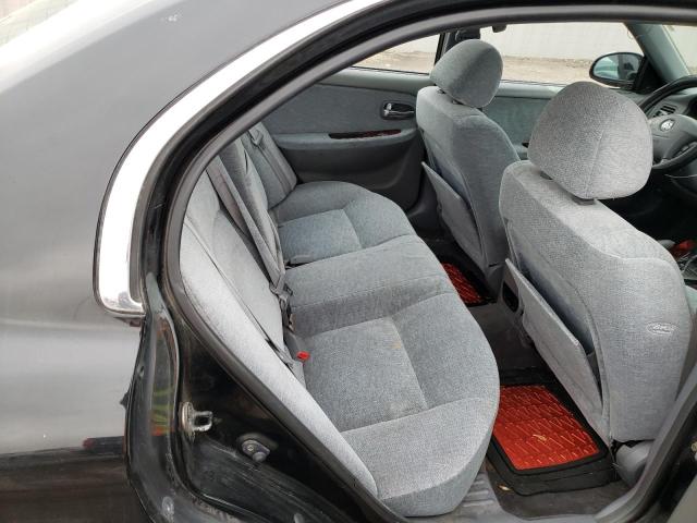 Photo 10 from auction – 2004 KIA OPTIMA LX with VIN KNAGD128245360520