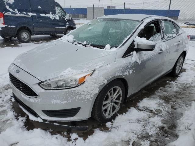 FORD FOCUS SE 2018 with VIN 1FADP3F24JL319351 - Photo from auction