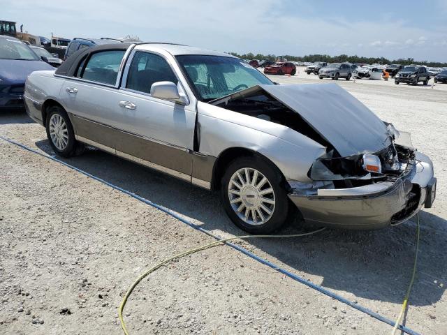 Photo 4 from auction – 2004 LINCOLN TOWN CAR E with VIN 1LNHM81W14Y655733