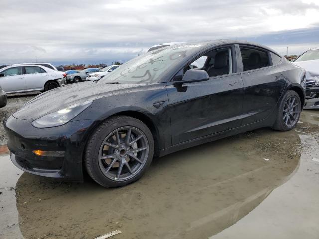 TESLA MODEL 3 2021 with VIN 5YJ3E1EA3MF090824 - Photo from auction