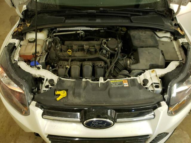 Photo 11 from auction – 2012 FORD FOCUS TITA with VIN 1FAHP3J25CL477080