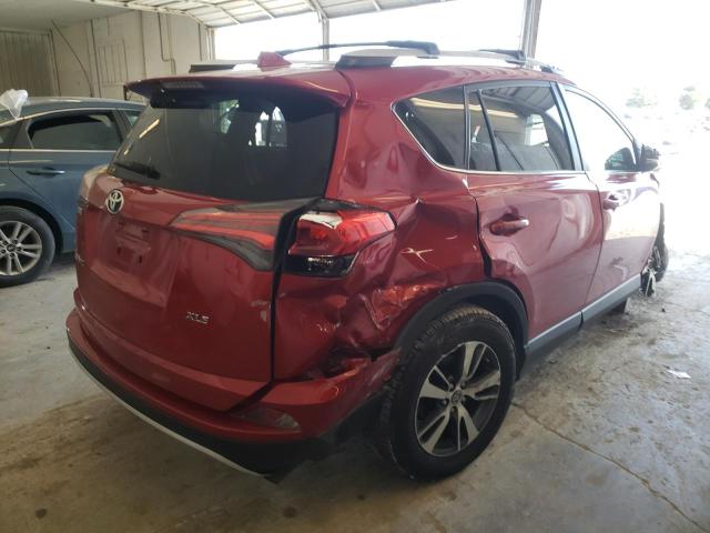 Photo 3 from auction – 2016 TOYOTA RAV4 XLE with VIN JTMWFREV3GJ060327