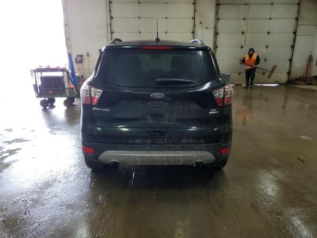 Photo 6 from auction – 2017 FORD ESCAPE SE with VIN 1FMCU9GDXHUC98779