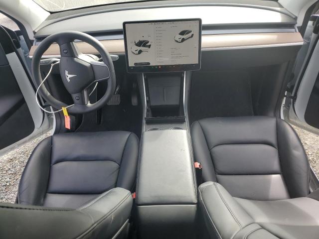 Photo 8 from auction – 2021 TESLA MODEL Y with VIN 5YJYGDED7MF115008