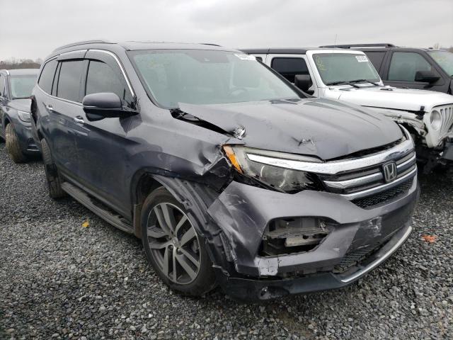 Photo 4 from auction – 2016 HONDA PILOT TOUR with VIN 5FNYF5H94GB016943
