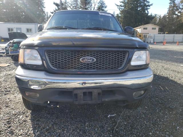Photo 5 from auction – 2000 FORD F150 with VIN 2FTRX18L4YCB06558