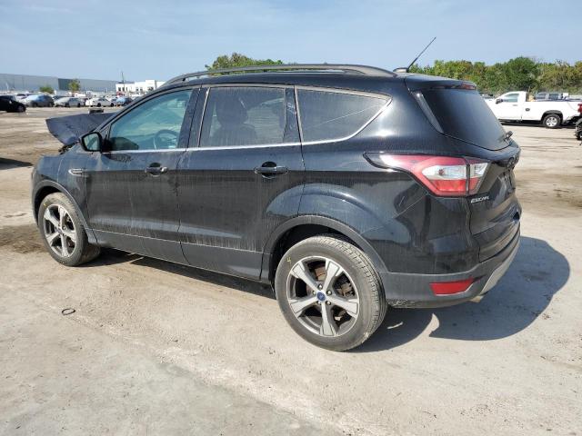Photo 2 from auction – 2017 FORD ESCAPE SE with VIN 1FMCU0G94HUF04556
