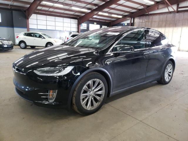 TESLA MODEL X 2018 with VIN 5YJXCDE2XJF129826 - Photo from auction