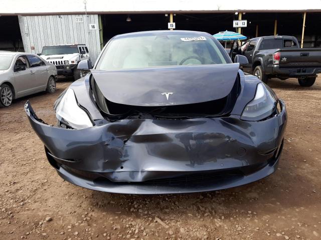 Photo 5 from auction – 2021 TESLA MODEL 3 with VIN 5YJ3E1EB6MF045840