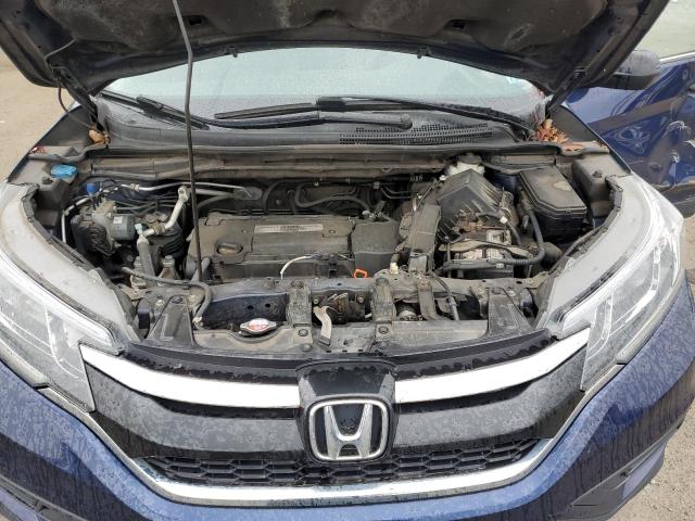 Photo 11 from auction – 2015 HONDA CR-V LX with VIN 2HKRM4H31FH642840