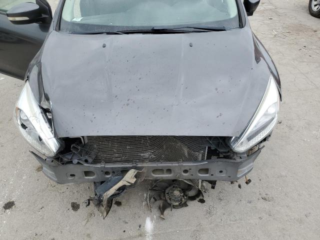 Photo 11 from auction – 2015 FORD FOCUS SE with VIN 1FADP3F28FL333034