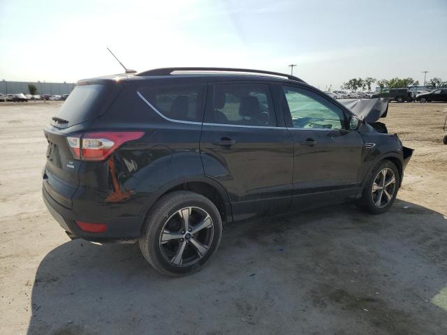 Photo 3 from auction – 2017 FORD ESCAPE SE with VIN 1FMCU0G94HUF04556