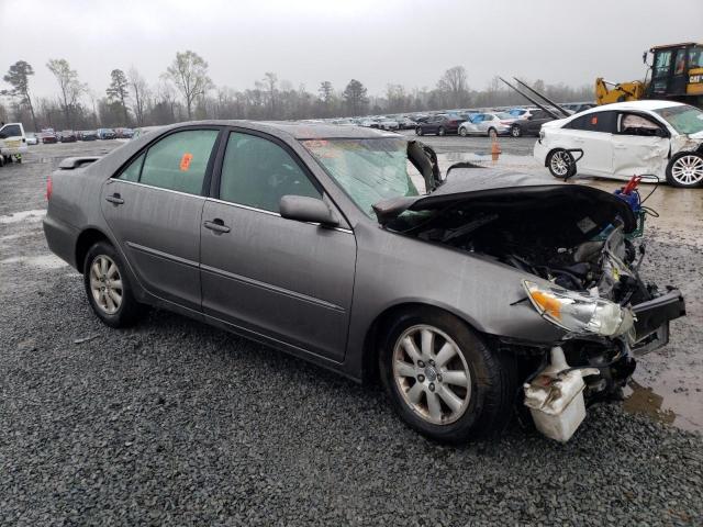 Photo 4 from auction – 2004 TOYOTA CAMRY LE with VIN 4T1BF30K04U589569