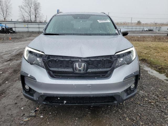 Photo 5 from auction – 2022 HONDA PILOT SE with VIN 5FNYF6H20NB040727